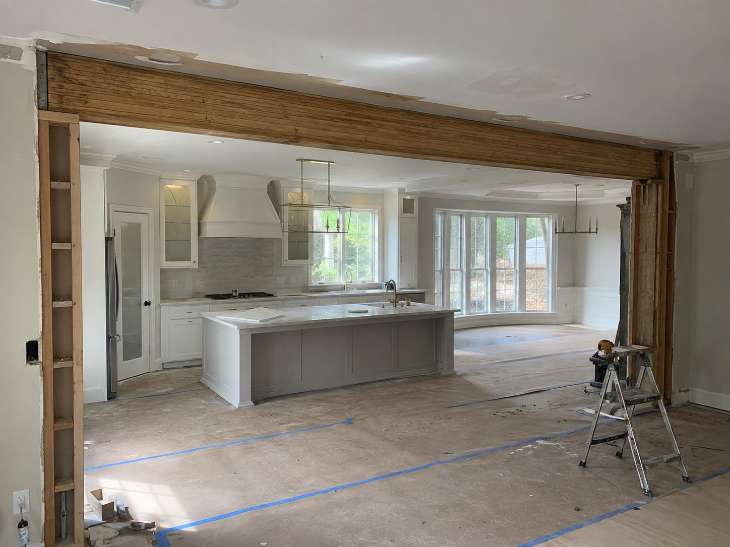Project photo — engineered beam at a removed kitchen wall, Southlake